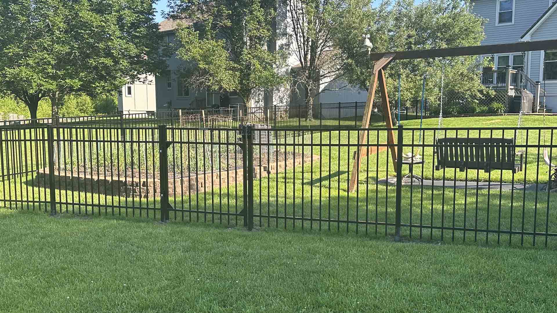 Example 10 of a residential aluminum fence fabricated and installed by Slagle Fence in Kansas City