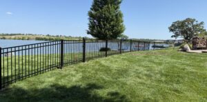 3 rail flat top steel fence at lake
